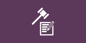 icon showing a gavel and a pencil writing