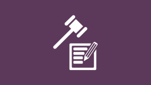 icon showing a gavel and a pencil writing