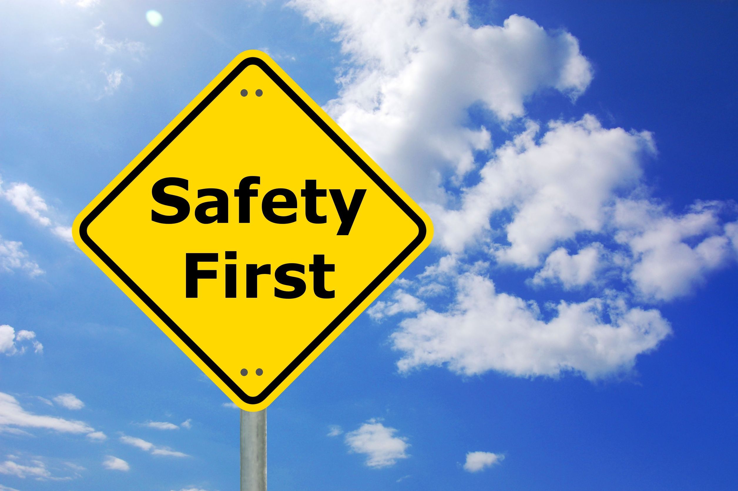 safety tips sign with blue skies background