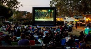 Park with people watching a movie 