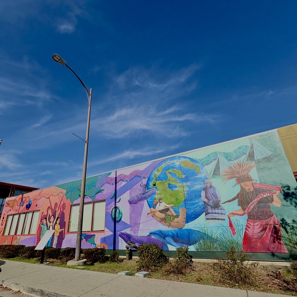 "Peoples of the Canal" mural painted on the facade of Al Boro Community Center.