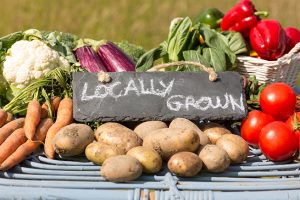 Organic vegetables on a stand at a farmers market