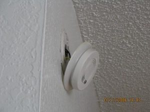 dangling smoke detector