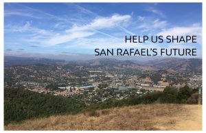 Alt text: Image depicts a sunny view of the Marin Civic Center from the top of a hill in North San Rafael. Text reads: “Help us Shape the Future of San Rafael”