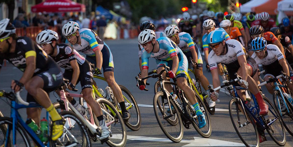 Cyclists compete in the Sunset Criterium bike race in Downtown San Rafael