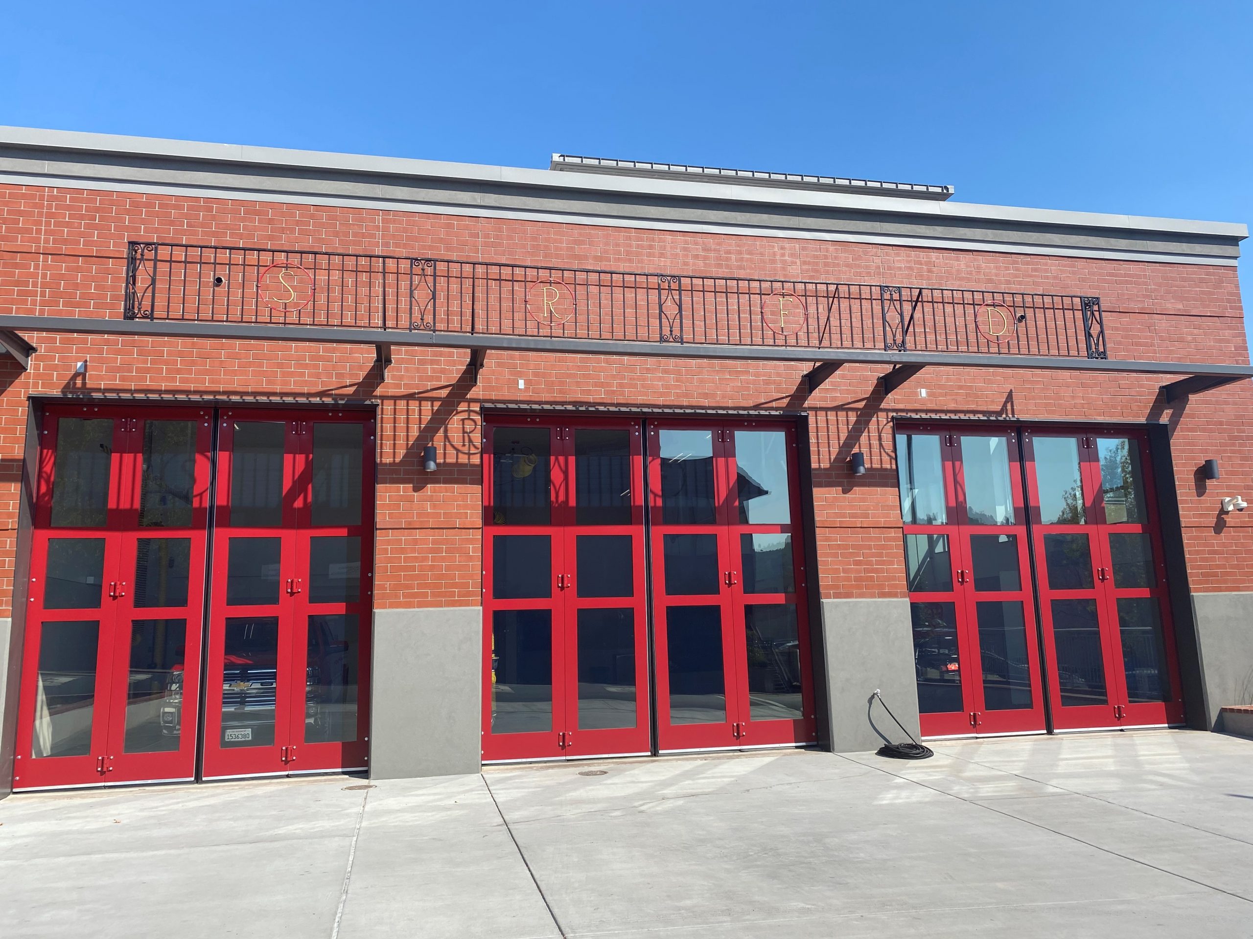 Historic Decorative Guard Rail and Bell – Salvaged from the Original Fire Station