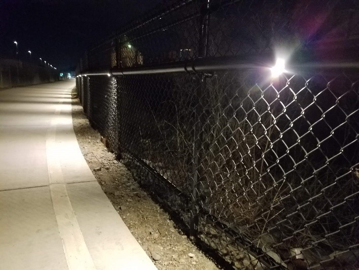 lights on chain link fence