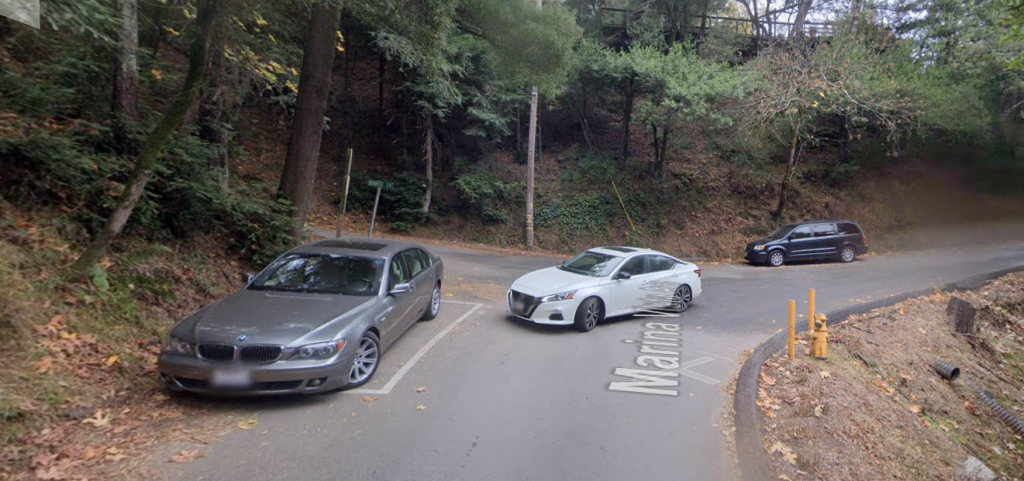 Google street view of parking boxes on narrow hill streets