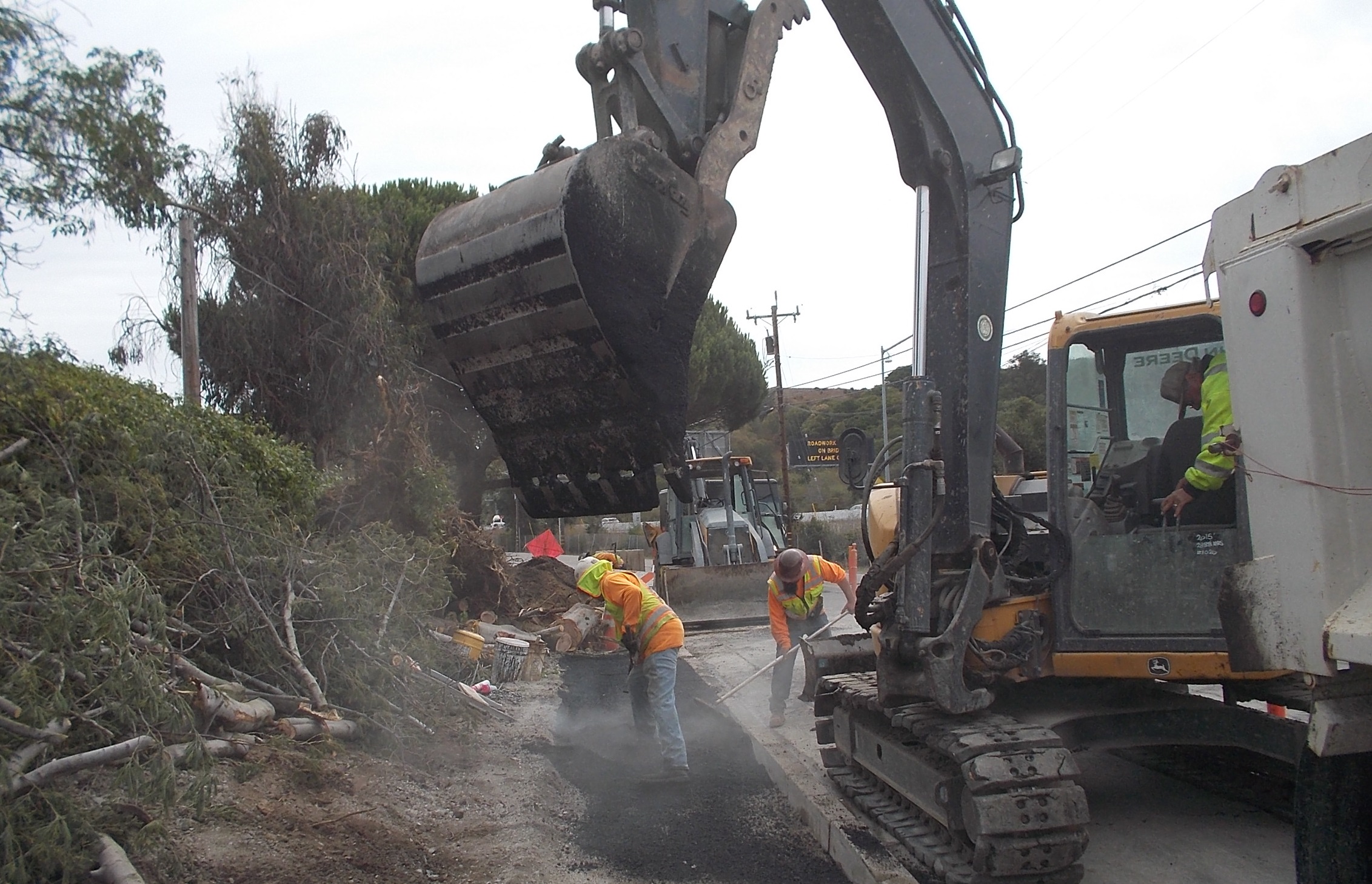 Bay Pacific Pipelines paving temporary asphalt sidewalk on Francisco Boulevard East