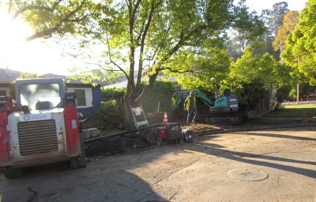 Contractor working on Woodland Ave sewer improvement project