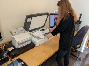 Library Staff Matthew Hurley creating digital files in the Randy Coleman Memorial Lab