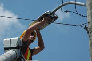 Changing street light bulbs