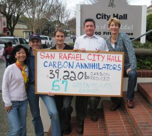 City Staff 2012 holding sign outside of City Hall 