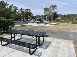 Spinnaker Point parking modification project parking spaces created showcasing new picnic tables