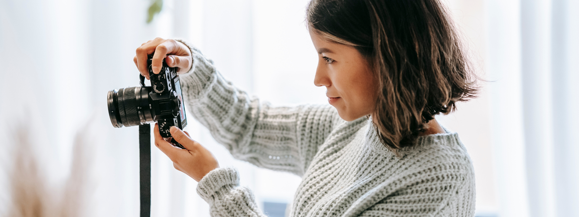 lady holding camera taking picture