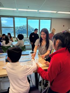 Students learn from construction engineer