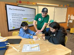 Students learn from construction engineer