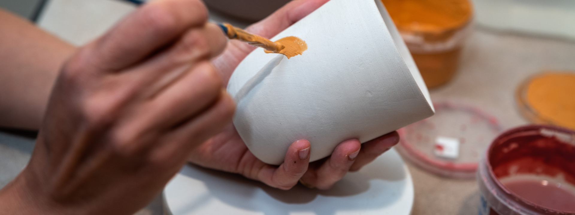 hand painting white cup