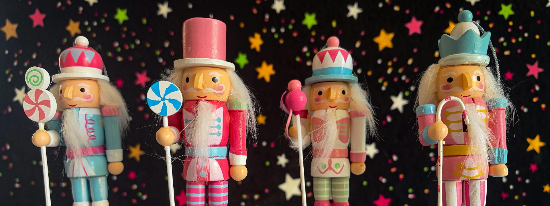 nutcracker figurines on stary background