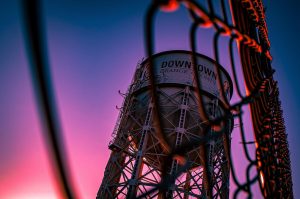 Water Tower Behind Fence