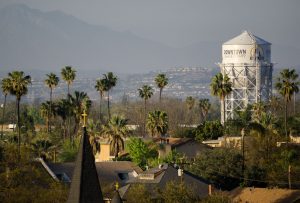 Aerial view of water tower and palm trees