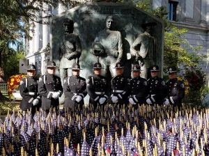 Honor Guard group photo in front of statue