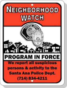 Neighborhood Watch Sign with words "Neighborhood Watch program in force, we report all suspicious persons and activity to the Santa Ana Police Department, (714) 834-4211"