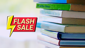 books on table next to flash sale wording