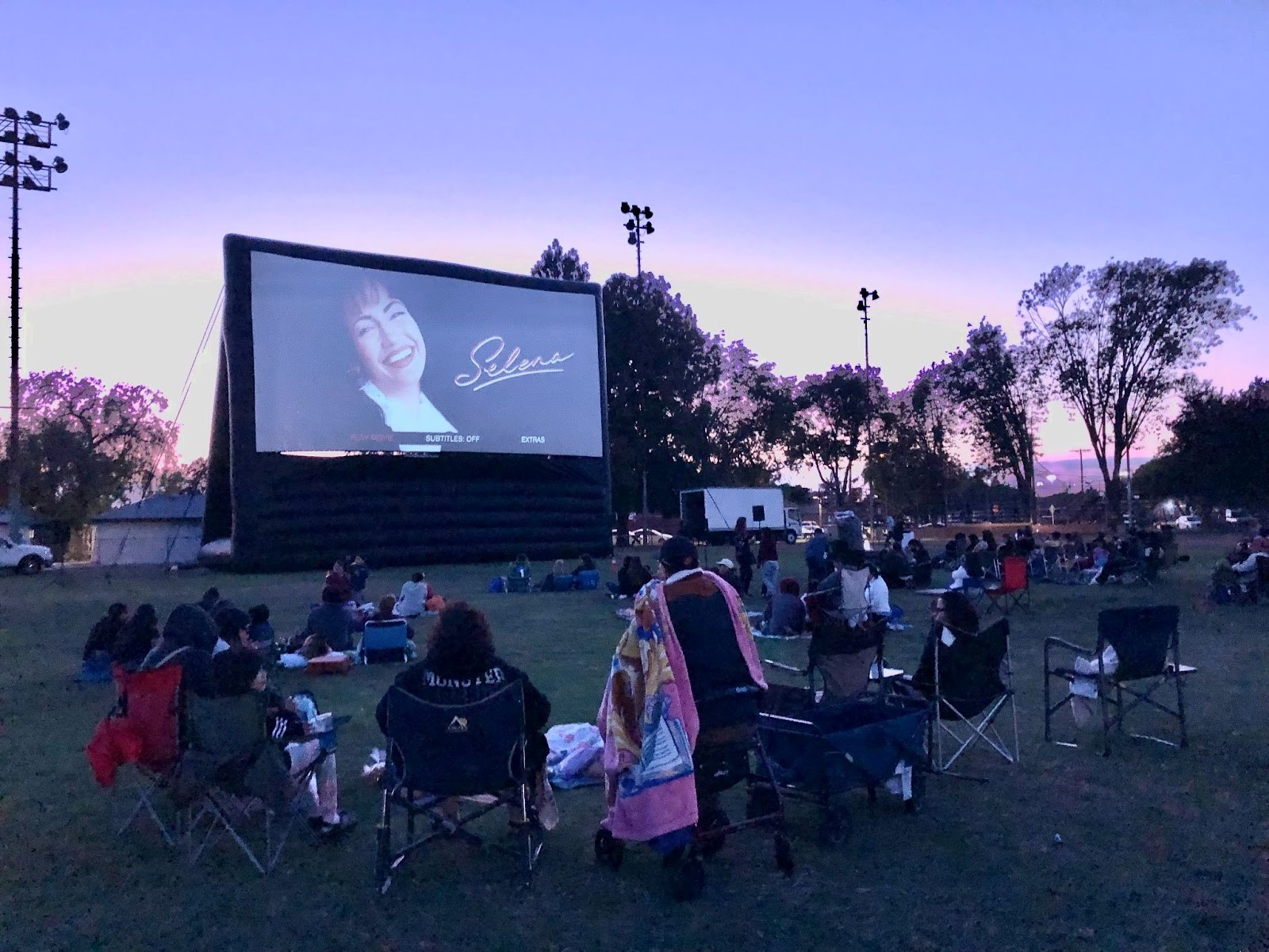 An outdoor screening of Selena at a park