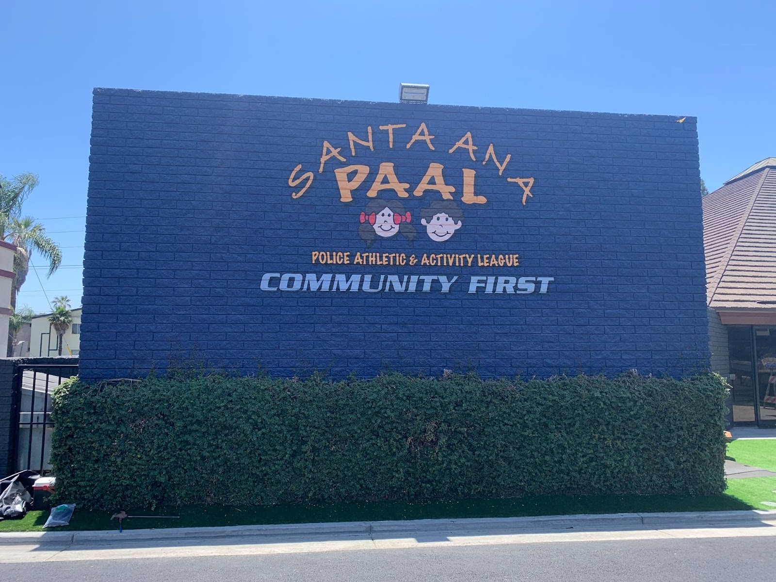 Building mural of the Santa Ana Police Athletic and Activity League logo