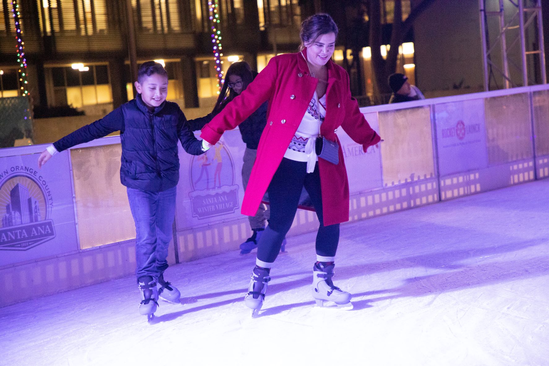 Winter Village - two kids skating