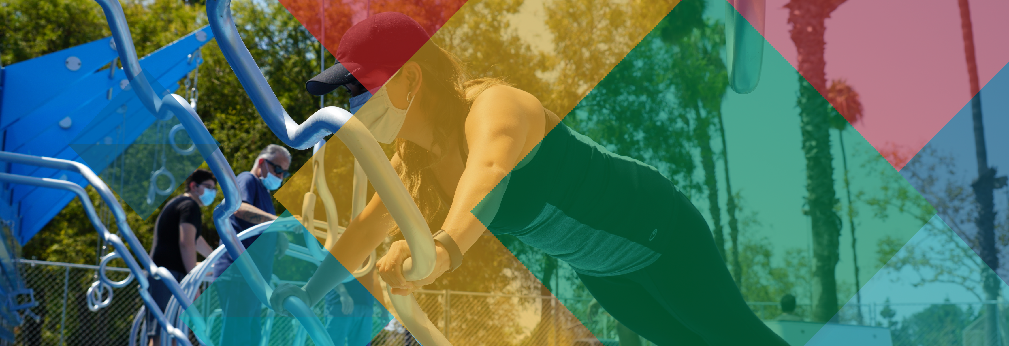 Woman working out on outdoor fitness equipment