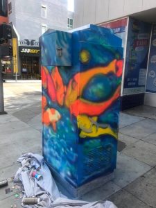 Utility box with art of koi fish