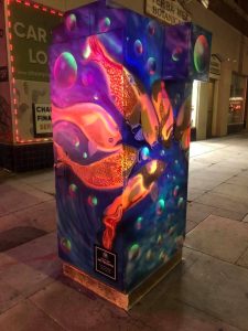 Utility box with art of koi fish