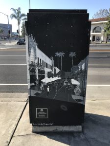 Utility box with art of the downtown Santa Ana night scene