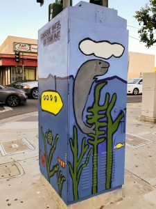 utility box with art of playful sea creatures and a submarine