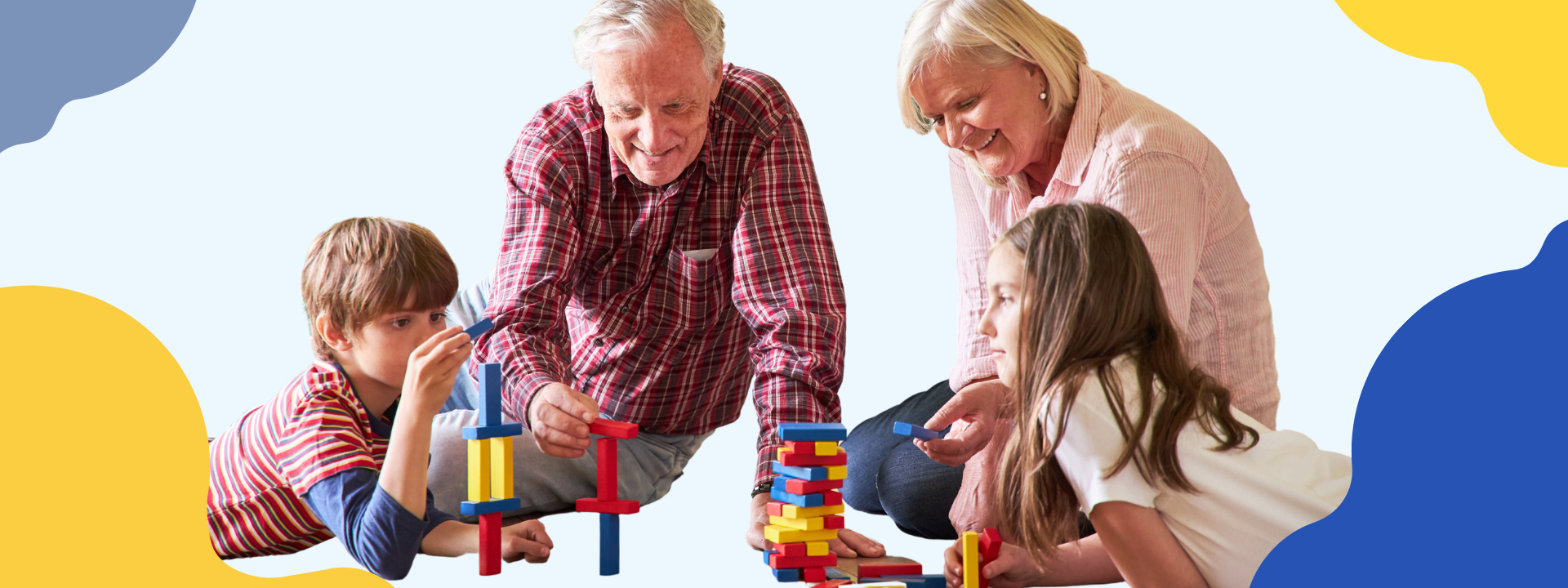 grandparents playing with kids and blocks