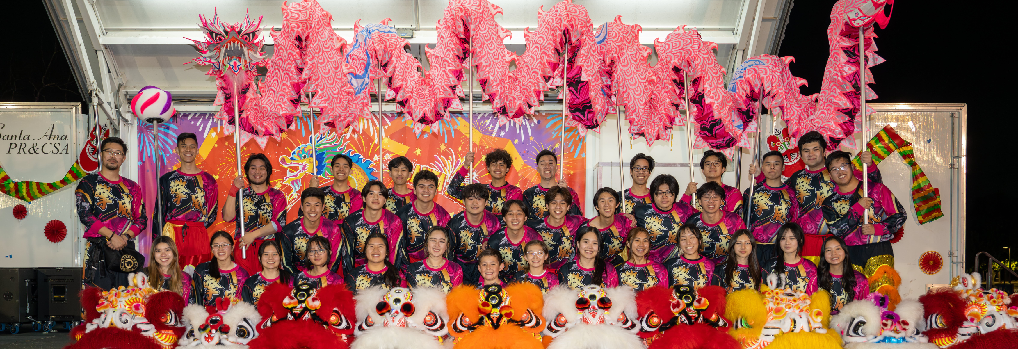 Tết (Lunar New Year) Festival stage image with dragon dance performers