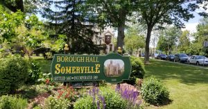 Sign in front of Somerville Borough Hall