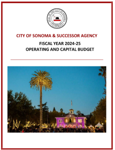 A cover for the fy 24/25 budget with a photo of the Sonoma Plaza during a winter event.