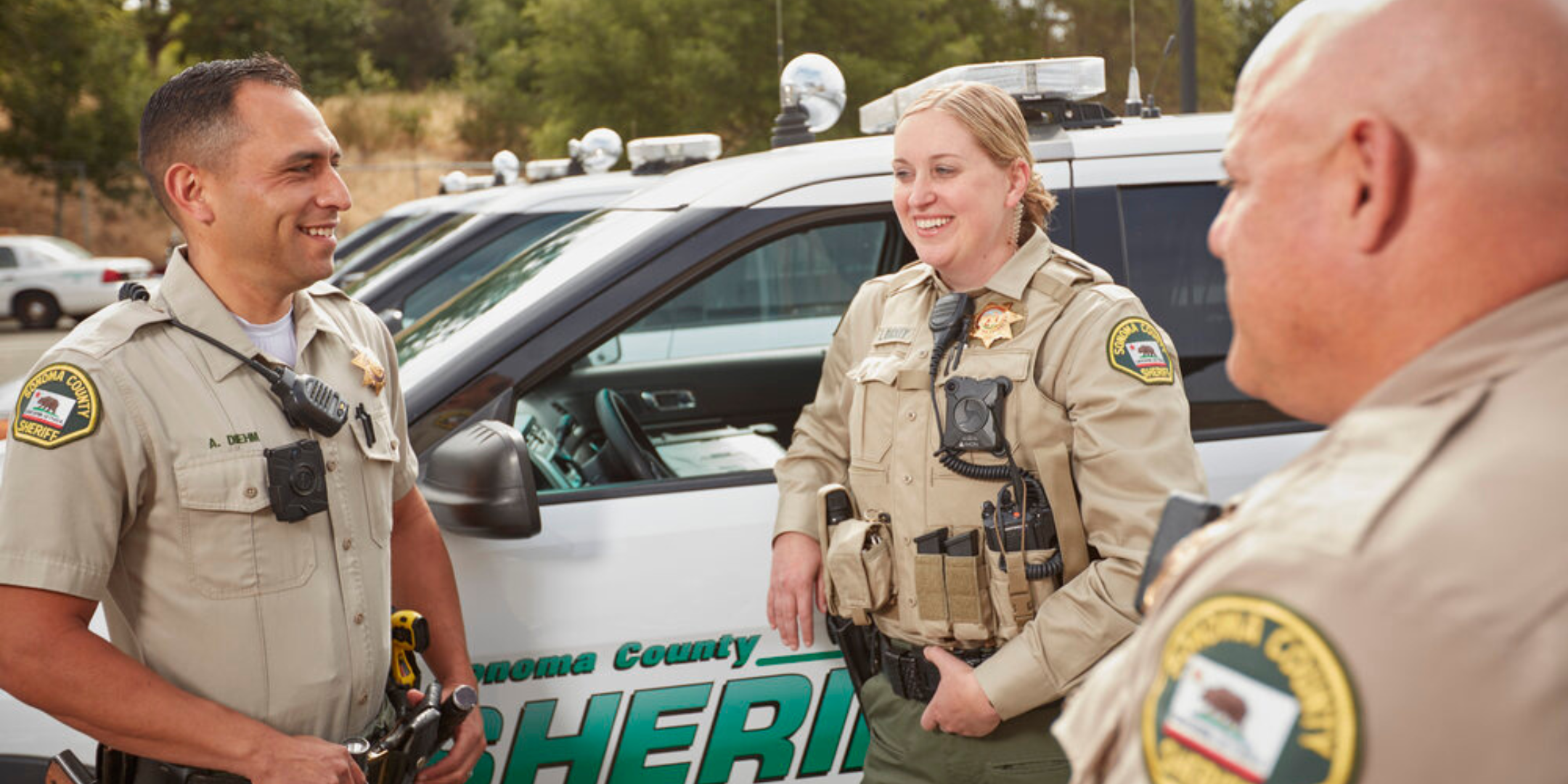 Three Sonoma Sheriff's deputies in uniform.