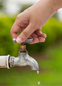 Photo of handing turning off water