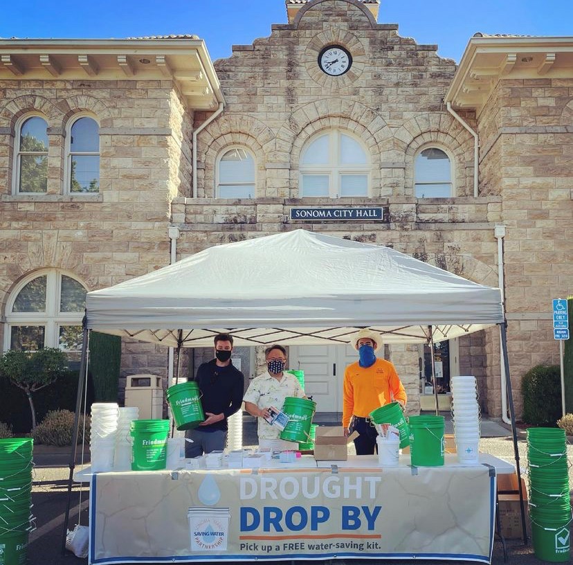 Councilmembers Kelso Barnett and Jack Ding along with Mike Brett, the City's water conservation coordinator handed out drought kits in June. Drought Drop By
