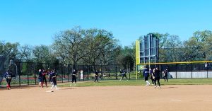 Team practicing baseball.