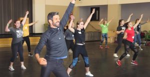 Photo of teenagers in a dance class.