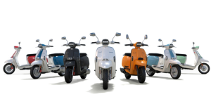 Eight Lambretta brand scooters on display.