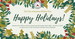 Green and gold foliage with red flowers around Happy Holiday message.