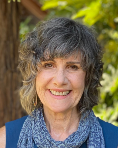 Portrait of a woman with trees in the background