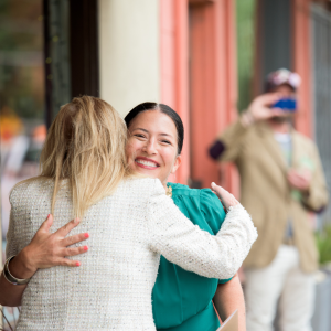 Mayor Lowe and the US Poet Laureate hugging.