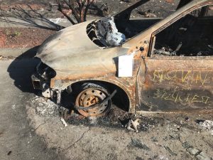 Burned Vehicle in Street